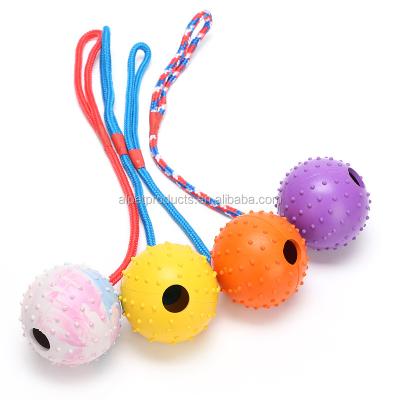 China Sustainable Interactive Dog Treat Rubber Spiky Ball With Cotton Rope Training Chew Dog Toys Ball for sale