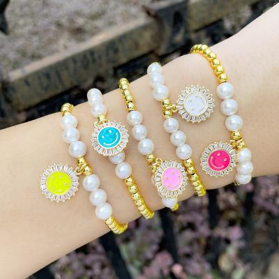 China Cute Hiphop Jewelry Designer Happy Face Flower Butterfly Charm Gold Plated Bracelets Set For Women for sale