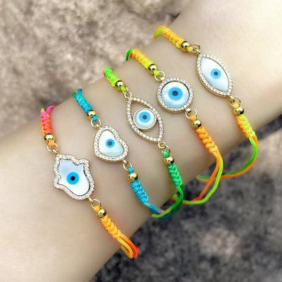 China Hiphop Jewelry Designer DIY Handmade Colorful Blue Eye Threaded String Bracelet for sale