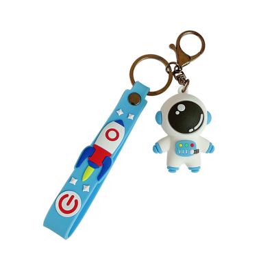 China Creative Souvenir Gifts Promotion Cartoon Astronaut Spaceman Silicone Keychain Pendant For Woman Bag Children Book Backpack for sale