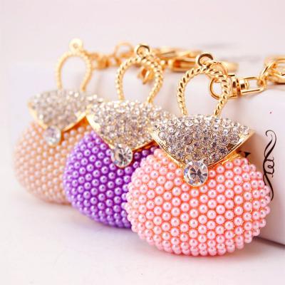 China Promotion Gift E-141 Fashion Creative Crystal Keychain Pearl Bag Keychain Mini Bag Souvenir Gift Key Chain for sale