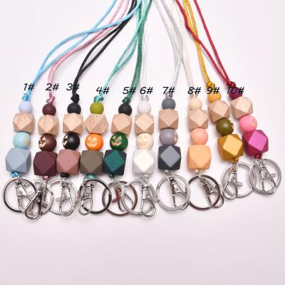 China Metal Key Chain Gift Send Halloween Silicone Wood Bead Lanyard Keychains With Clip Fashion ID Badge Hold Beaded Lanyard Key Chain Girls For Teachers Gift for sale