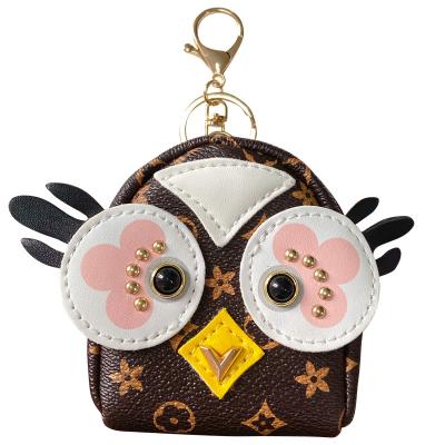 China Hot Selling Environmental Friendly Leather Storage Key Chain Owl Coin Purse Keychain Mini Cartoon E-81 for sale