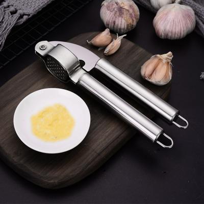 China Amazon Kitchen Viable Garlic Press and Slicer Grinder Meat Grinder Tool Garlic Press Stainless Steel with Handle for sale