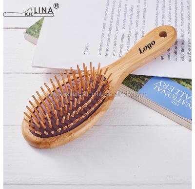 China Wooden Cushion Cleaning for Curly Hair Bristle Wooden Paddle Brush for sale