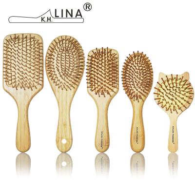 China Bamboo Bristle Hair Brush Paddle Scalp Massage Wooden Hair Brush With Logo Customized for sale