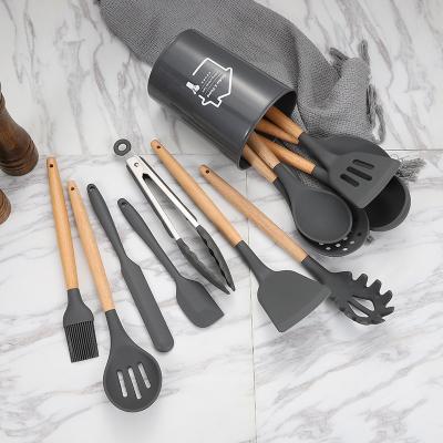 China Amazon Stocked Hot Selling Kitchen Tools Utensils Set Anti-Scald Wooden Handle Silicone Non-Stick Pan Cooking Shovel Spoon Colander Set for sale