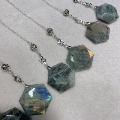 China China Natural Labradorite Hexagon Crystal Cuttings Stone Purple Showy Quartz Labradorite Gemstone Pendulums Pendants For Sale for sale