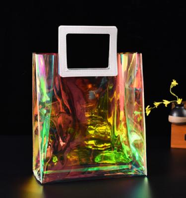 China Recyclable Popular Insti PVC Handbags Fashion PVC Bag Shiny Holographic Makeup Pouch Travel Makeup Pouch for sale