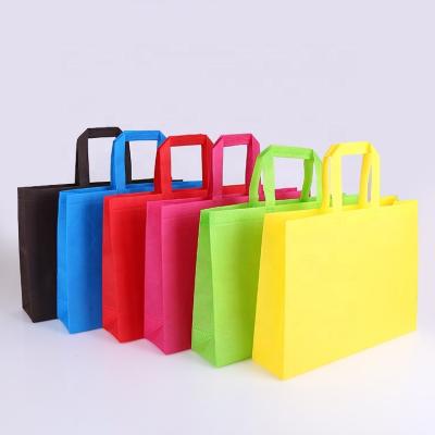 China Stylish reusable colored fabric plain promotion retail non woven bag with logo for sale