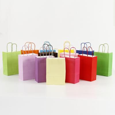 China Recycled Materials Custom Logo Small Colorful Gift Packaging Kraft Paper Bag for sale