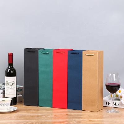 China Recyclable universal red wine gift paper bag eco portable wine packaging paper bag with printing logo for sale