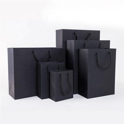 China Recyclable Black Cardboard Business Paper Gift Bag Customized Clothing Shopping Handbag With LOGO for sale