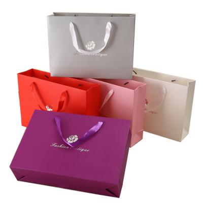 China Recyclable Wholesale Different Color Paper Shopping Bag For Packaging Clothes for sale