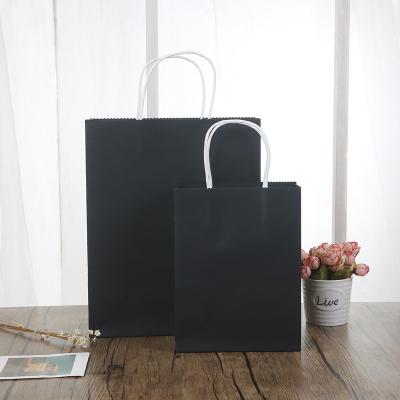 China Recyclable Low Cost Custom Machine Making Kraft Paper Storage Packing Carrier Black Paper Bag for sale