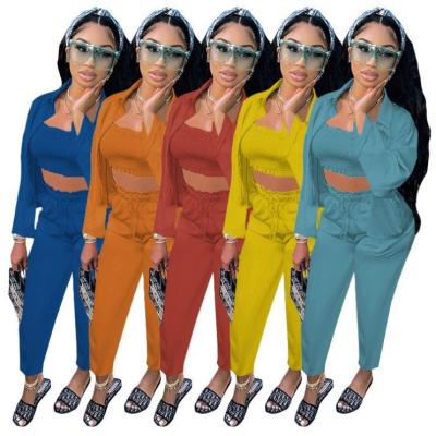 China 2021 QUICK DRY 3 piece biker set pleated women clothing solid color 2 piece jogger yoga set with shirt for sale