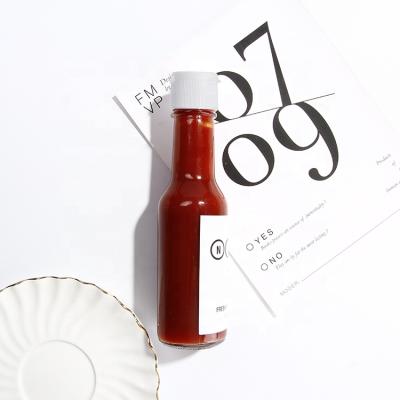 China Glass Bottle Kitchen Use 150ml 5oz Empty Transparent Glass Sauce Bottle Packaging For Chili Paste Sauce for sale