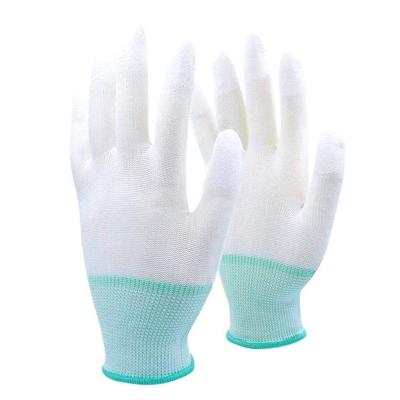 China Lightweight 13gauge anti-static and flexible white PU fingertip coated good handle knitted wrist safety gloves for sale