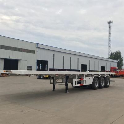 中国 Flatbed Transport Semi Trailer 3 Axles Heavy Duty 30t For Transport Container 販売のため