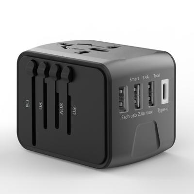 China 2019 March EXPO Promotion Type C Universal Travel Adapter Global International Travel Adapter with 4 USB Smart Charging Ports for sale