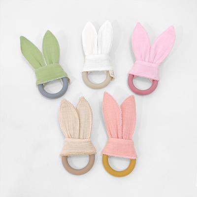 China Soft Bunny Ear Hand Teething Toy Fabric Rabbit Baby Shower Gifts Sensory Natural Silicone Ring Teether Stroller Rattles Cotton for sale