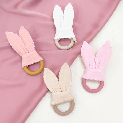 China Soft Silicone Ring Teether Cotton Fabric Rabbit Bunny Ear Teething Toy Custom Wholesale Baby Sensory Food Grade for sale