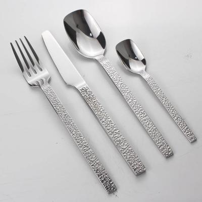 China Food Grade Stainless Steel Sustainable Vintage Stone Grain Hammered Cutlery Set Gold Plated Wedding Flatware for sale