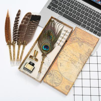 China The new and unique high-end atmosphere! Natural Peacock Feather Dipped in Water Pen Set Writing Ink Luxury Customizable LOGO Christmas Gift Box for sale