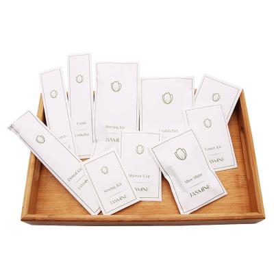 China Eco Custom Logo Hotel Amenities Kit Hotel Stonepaper Amenity Set Series Eco-Friendly Disposable Amenities for sale