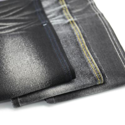 China Shrink-Resistant Fabric Cheap Black Cotton Washing Jeans Material Stock Prices for sale