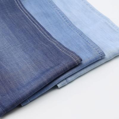 China Breathable Phone Woven Fabric Cotton Polyester Stock Lot Dark Blue Denim Fabric for sale