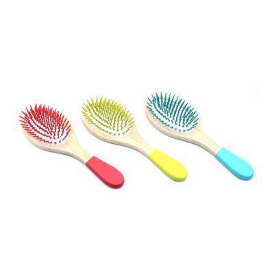 China Cushion Natural Bamboo Handle With Colorful Wooden Pins Paddle Hair Brush For Girls for sale