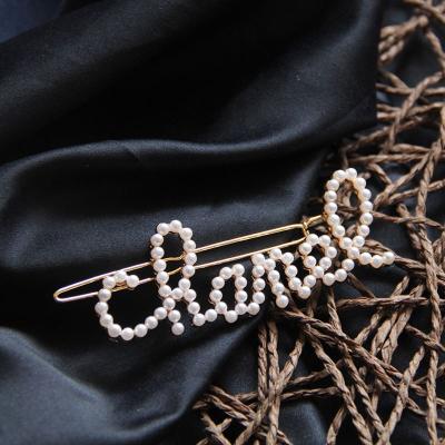 China Wholesale Environmentally Friendly Ornaments Fashion Metal Gold Letter Hair Clip Crystal Covered Words Hair Clip for sale