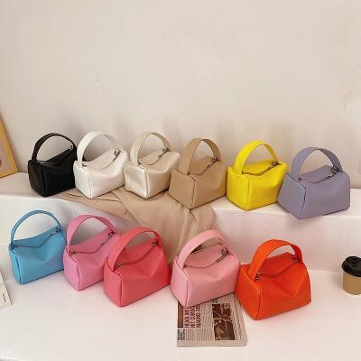 China 2021 Summer Girls' Fashion Small Shoulder Popular Handbags Clip Below Young Lady's Bags Cheap Hand for sale