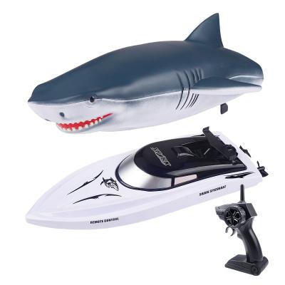 China New 2.4G plastic rc shark two in one boat summer high speed water kids electric remote control toys for sale