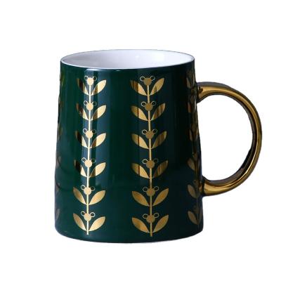 China Sustainable Hot Sale A Grade Porcelain Mug Gold Leaves Design Mlik Ceramic Mug With Lid for sale