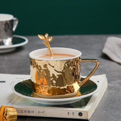 China Viable Veiny And Textured Ceramic Gold Plated Coffee Cup And Saucer With Spoon For Coffee Premium Wedding Gift for sale