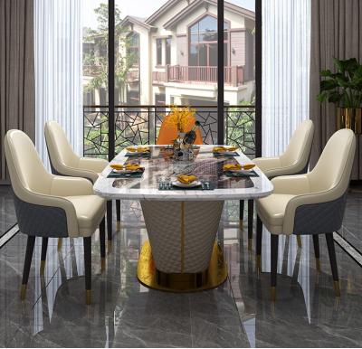 China Modern Stainless Steel Leg With Marble Pattern Luxury Italian Leather Splicing Top Dining Table for sale