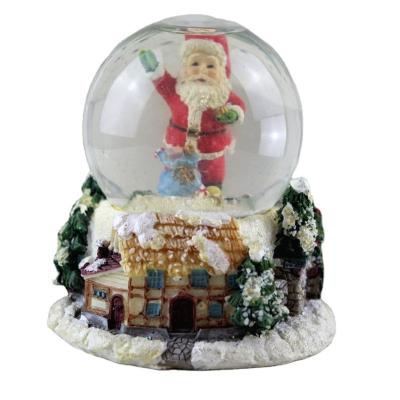 China Resin Vintage Snow Globe Water Balls 80MM Christmas Handmade Carved Glass Ball Santa Claus Decoration Table Decoration for sale