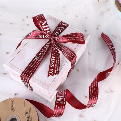 China Factory Price Elegant Custom Ribbon Christmas Ribbon With Logo For Gift Wrapping for sale