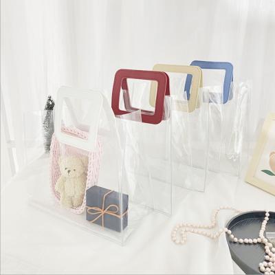 China Recycled Materials Ready To Ship Clear PVC Tote Bag Girls Shopping Bag Cheap Handbags MOQ 1 Piece for sale