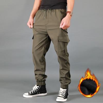 China Winter Anti-Pilling Sport Sweatpants Casual Warm Cargo Work Pants Multi Pocket Thick Fleece Mens Joggers Harem Pants Loose Trousers Mens for sale