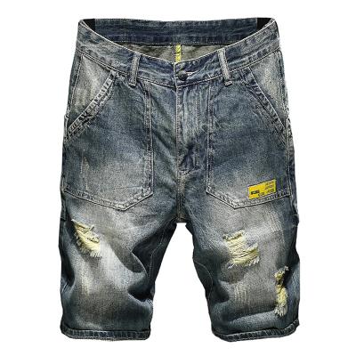 China Breathable Summer Shorts Jeans Mens Loose Hip Hop Distressed Fit Shorts Denim Pants Hollow Out Jean Shorts Mens for sale