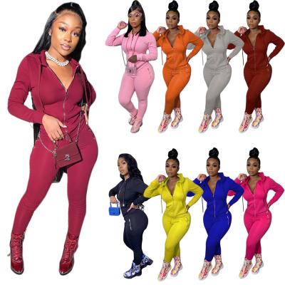 China Breathable Women's Long Sleeve Sports Sweatpants Two Piece Solid Color Casual Hoodie Jogging Sweatsuit Suit With Zipper Pockets for sale