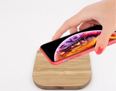 China New creative mobile phone design the log QI 10W fast bamboo wireless charging wireless charger for sale