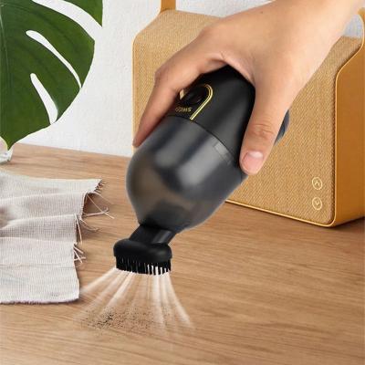 China Hotel YIZHI Study Desk Table Keyboard Dust Remover Handheld Portable Radio Small Mini Vacuum Cleaner for Office for sale