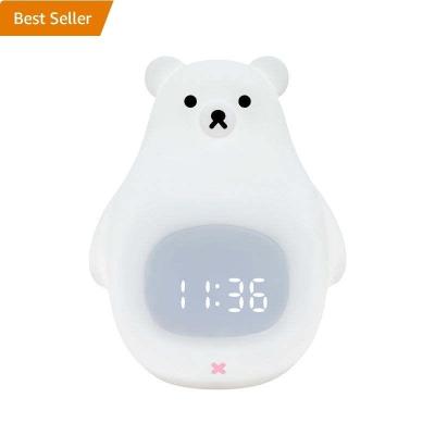 China YIZHI Cartoon Kids Toy Clock Skin Friendly Silicone Wake Up Baby Night Light Sunrise Wake Up Sleep Trainer For Kids Bedroom for sale