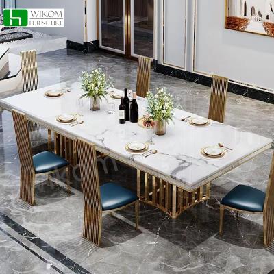 China Post-modern dining table combination household rectangular stainless steel dining table for sale