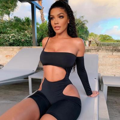 China Viable Black Solid One-Shoulder Hollow Sleeve Beach Style Asymmetric Rompers Reduce Neck Skinny Streetwear Jumpsuit for sale