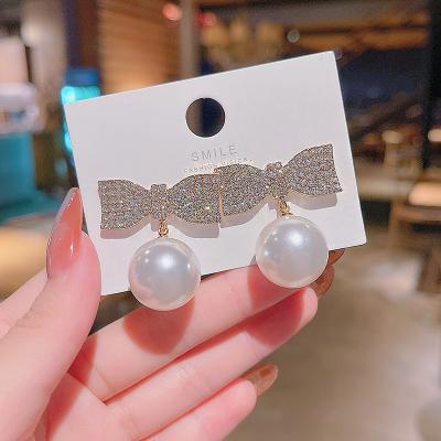 China FASHIONABLE exaggerate rosette pearl earrings personality female lightweight luxury earring exquisite unique ear studs for sale